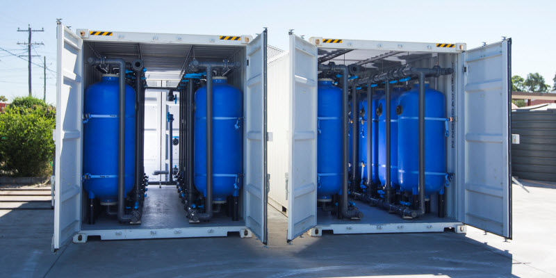 Blue tanks inside a container